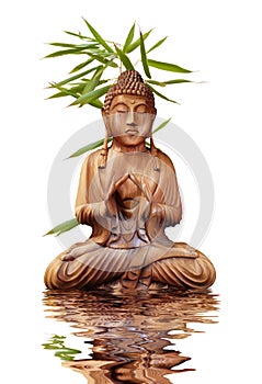 Buddha in harmony with bamboo reflektion over rippled water