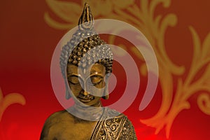 Buddha Head in Red Background