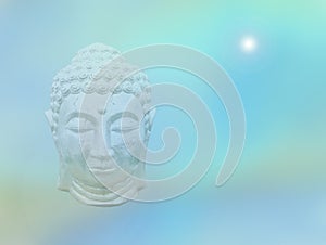 Buddha head on turquoise meditative background