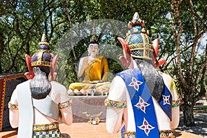 Buddha and his disciple statue in the forest