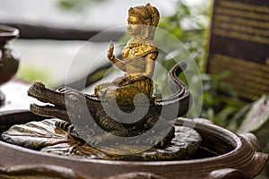 Buddha idol in temple in Thailand