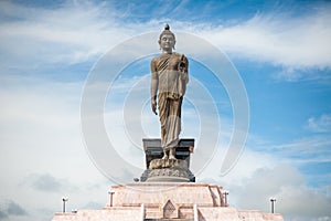 Buddha Image on blue sky, Thailand