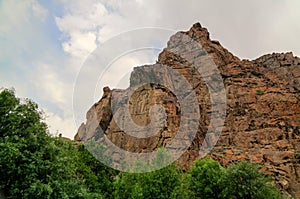 Buddha image on rock over Kar Gah river, Karakorum, Pakistan