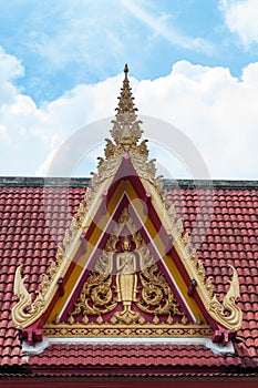 Buddha image at roof gable