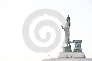 Buddha image in walking posture