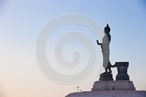 Buddha image in walking posture