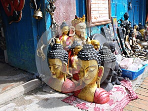 Buddha images in a shop at the Boudhanath stupa in Kathmandu, Nepal