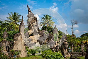 Buddha park Xieng Khouane in Vientiane, Laos. Famous travel tourist landmark of Buddhist stone statues and religious figures