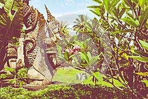 Buddha park Xieng Khouane in Vientiane, Laos. Famous travel tourist landmark of Buddhist stone statues and religious figures