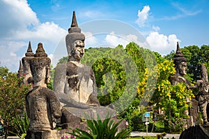 Buddha park Xieng Khouane in Vientiane, Laos. Famous travel tourist landmark of Buddhist stone statues and religious figures