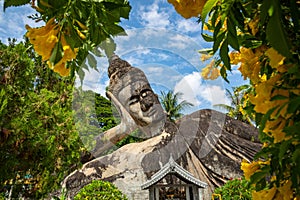 Buddha park Xieng Khouane in Vientiane, Laos. Famous travel tourist landmark of Buddhist stone statues and religious figures