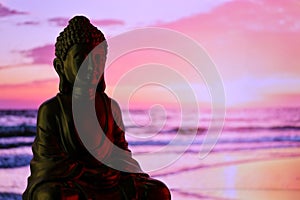 Buddha Purnima and Vesak day concept, Buddha statue with low key light against beautiful and colorful background