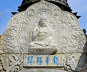 Buddha relief on the memorial gateway