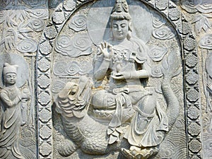 Buddha relief on the memorial gateway