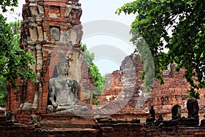 Buddha sculptures made of rock in the temple ruins of Wat Phra Sri Sanphet. Ayutthaya, Thailand.