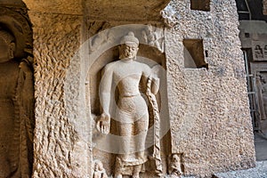 Buddha sculptures on wall at entrance to the largest Kanheri cave at Sanjay Gandhi National Park, Mumbai, India