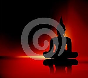 Buddha silhouette against red background