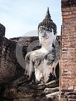 Buddha statue in ancient temple in Thailand