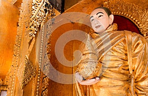 Buddha statue in a beautiful temple. Buddha statue in a niche. B
