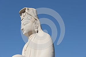 Buddha statue, blue-sky background