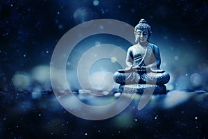 Buddha Statue on Blurred Blue Background