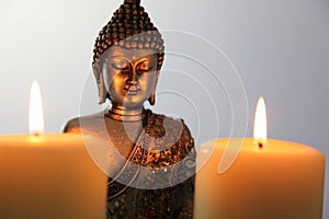 Buddha Statue and Candlelight