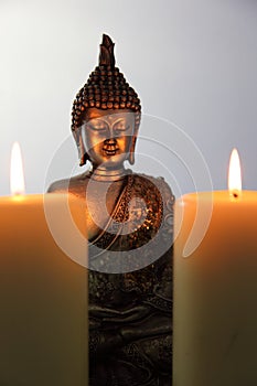 Buddha Statue and Candlelight