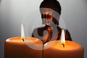 Buddha Statue and Candlelight