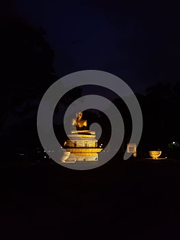 Buddha statue captured at night photo