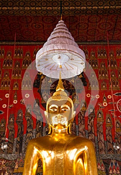 Buddha statue in consecraed consecrated convocation hall of Wat Saket photo