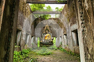 Buddha statue in decadent chapel at Sangkhla Buri.