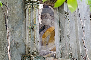 Buddha statue in decadent chapel at Sangklaburi