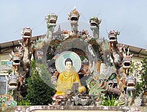 Buddha statue with dragons