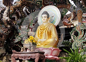 Buddha statue with dragons