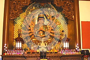 Buddha statue with eighteen arms in the Lingyin temple, China