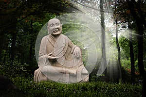 Buddha statue in enchanted garden