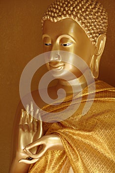 Buddha statue in the first teaching gesture