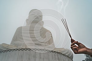 Buddha statue in the fog at SunWorld Ba Na Hills Danang, Vietnam