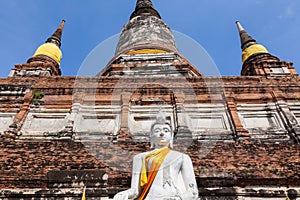 Buddha Statue in front of a mesmerizing spiritual temple in Thailand