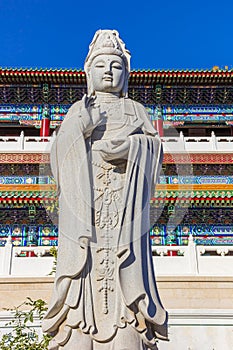 Buddha statue in front of the temple in the Dabei Monastery in Tianjin