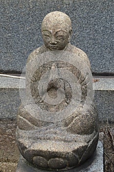 Buddha Statue On A Grave At Onomichi Japan