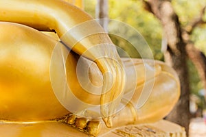 Buddha statue hands on nature background buddha