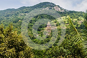 Buddha statue at a hill slope near Aluvihare Rock Temple, Sri Lan