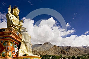 Buddha statue and Himalayas