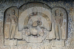 Buddha statue inside of Pandav Leni The Buddha Caves at Nashik, Maharashtra, India. This group of 24 caves located near Nashik