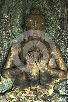 Buddha statue inside of Pandav Leni The Buddha Caves at Nashik, Maharashtra, India. This group of 24 caves located near Nashik photo