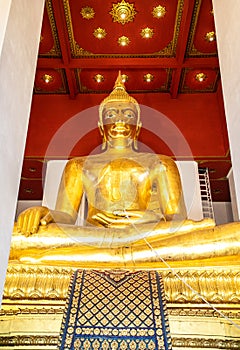 Buddha statue inside Wat Phra Mongkhon Bophit, a Buddhist temple of archaeological park, Ayutthaya