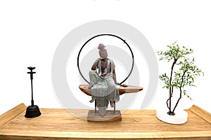 Buddha statue isolated against white background