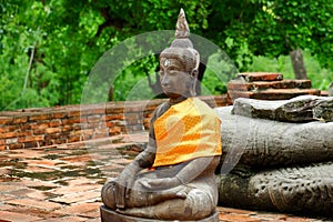 The Buddha statue is located outdoors.