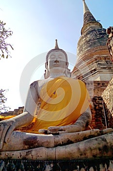 The Buddha statue is located outdoors.